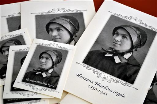 In this Aug. 25, 2015 file photo, pamphlets and prayer cards of Sister Blandina Segale sit on a table at the Catholic Center in Albuquerque, N.M. The Italian-born nun who once challenged Billy the Kid and later opened New Mexico hospitals and schools will soon be the subject of a television series. (AP Photo/Russell Contreras, File)