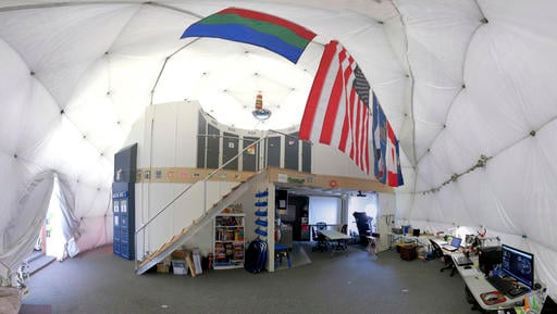 This Aug. 9, 2015 photo provided by the University of Hawaii shows the interior of the domed structure that will house six researchers for eight months in an environment meant to simulate an expedition to Mars, on Mauna Loa on the Big Island of Hawaii. The group will enter the dome Thursday, Jan. 19, 2017, and spend eight months together in the 1,200 square foot research facility in a study called Hawaii Space Exploration Analog and Simulation (HI-SEAS). They will have no physical contact with any humans outside their group, experience a 20-minute delay in communications and are required to wear space suits whenever they leave the compound. (Sian Proctor/University of Hawaii via AP)