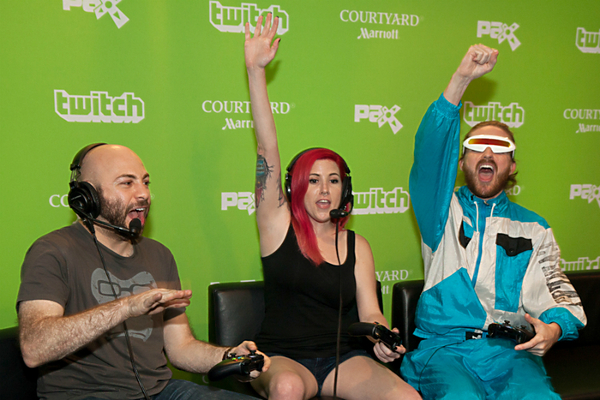 Avid gamers play video games during a Twitch live stream to kick off PAX Prime in Seattle, 2015. Photo: Matt Mills McKnight/Invision for Courtyard by Marriott/AP