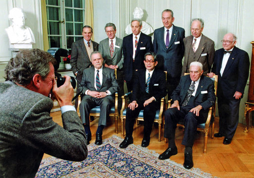 This Dec. 9, 1994 file photo shows George A. Olah, standing third from right, and other 1994 Nobel Prize laureates posing for a group photo at the Royal Swedish Academy in Stockholm. Olah, winner of the 1994 Nobel Prize in chemistry for his groundbreaking research into the unstable carbon molecules known as carbocations, has died at age 89. The University of Southern California said Olah died Wednesday, March 8, 2017 at his Beverly Hills, Calif., home. He taught at USC for many years. (AP Photo/Gunnar Ask, File)