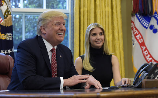 President Donald Trump, accompanied by his daughter Ivanka Trump, talks via video conference with International Space Station Commander Peggy Whitson on the International Space Station, International Space Station, from the Oval Office of the White House in Washington. (AP Photo/Susan Walsh)