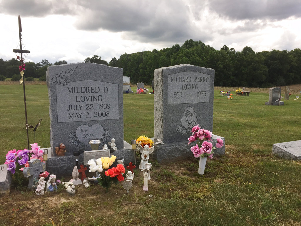 The graves of Richard and Mildred Loving are seen in a rural cemetery near their former home in Caroline County, Virginia, Wednesday, June 7, 2017. Richard Loving, a white man, and his wife Mildred, a black woman, challenged Virginia’s ban on interracial marriage and ultimately won their case at the U.S. Supreme Court in 1967. Monday, June 12, 2017 marks 50 years since the Supreme Court issued that opinion, which overturned laws against interracial marriage in 16 states. (AP Photo/Jessica Gresko)