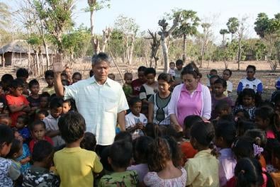 Giving thanks for their food. (Roslin Orphanage)