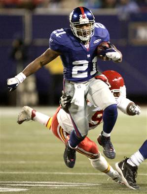 Here is Tiki Barber # 21, Playing for the Giants (www.aceonsports.com)
