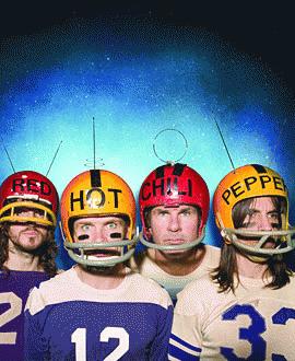 the Red Hot Chili Peppers, Kiedis far right (http://img.letssingit.com/artists/72db9/rhcp.jpg)