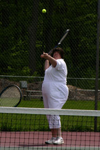 Grace's serves the ball at Regionals.