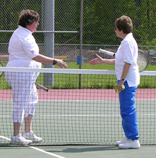 Grace talks with coach Lyn Nevins after the game.