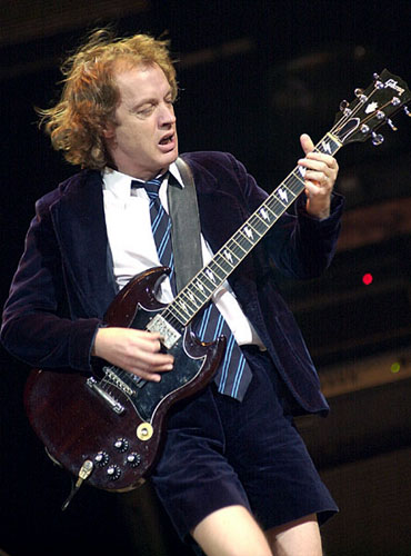 Angus Young in his schoolboy outfit (http://www.unplugged-cafe.org/images/9/9c/Angusyoung.jpg)