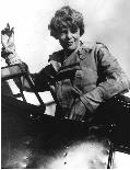 Amelia Earhart in her plane (http://z.about.com/d/womenshistory/1/0/X/d/2/amelia_earhart_ca_1932a.jpg)