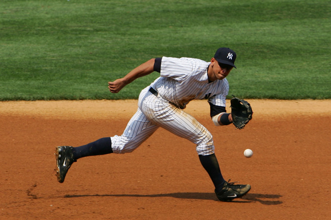 The New York Yankees' Alex Rodriguez takes fielding practice with