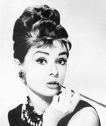 Audrey Hepburn modeling off her famous look (Photobucket)