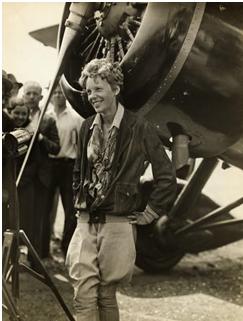 Earhart with her Lockheed Vega (www.toptenz.net)