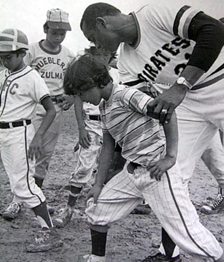 A younger Roberto Clemente in Canton, carrying on his