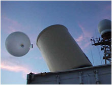 A sounding balloon launch from the R/V R. H. Brown with the C-band radar in the background. (Image courtesy of the University of Washington)