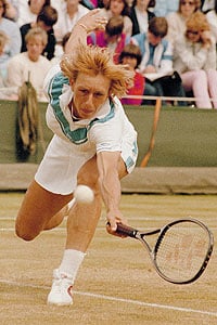 Martina is diving for the ball. (http://parvisradji.files.wordpress.com/2010/08/martina-navratilova.jpg)