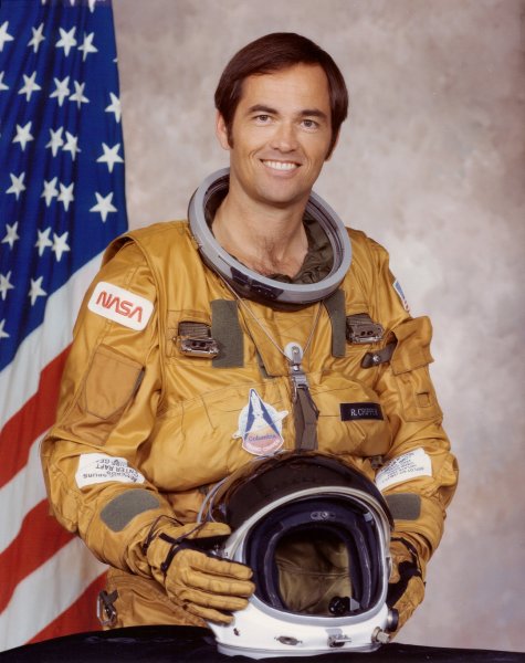 This picture shows Bob Crippen in his uniform (from NASA)