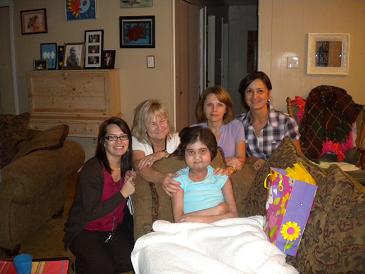 Anna ( on the couch ) and her 6th grade teachers  (Courtesy of Mrs.Fontenot.)