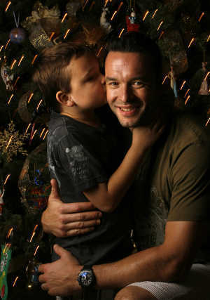 Olaf Kolzig with his son, Carson. (Photo by Dirk Shadd, St. Petersburg Times)