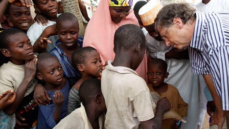 Bill Gates helping the poor.