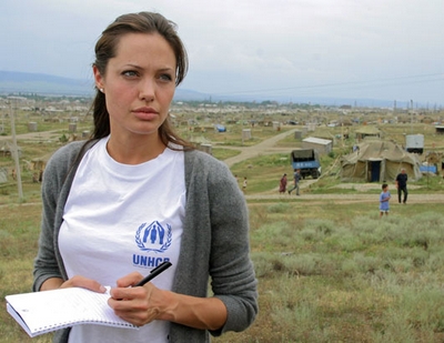 Angelina is working for the UNHCR  (http://media.icedbase.com/photos/0a/Angelina-Jolie-0805.jpg)