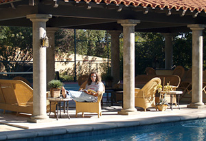 Tom sitting outside of the 17,000 square foot man (www.oprah.com)