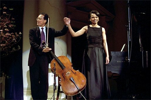 Rice playing piano with acclaimed cellist Yo-Yo Ma (http://upload.wikimedia.org/wikipedia/commons/f/f9/Yoyoma_rice.jpg)