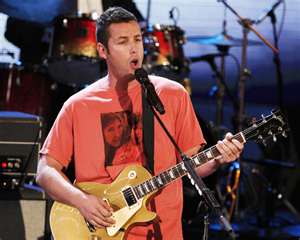 Sandler singing the Chanukha song