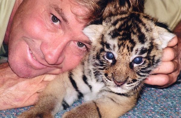Steve with baby tiger. (Google ())