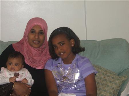 This is my mother with my little sister and I.  ( ())