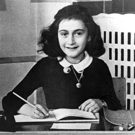 Anne Frank at a desk