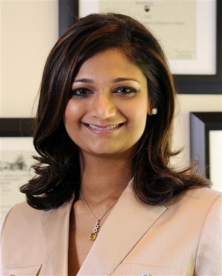 A portrait of Sonia Badreshia-Bansal in her office (http://www.elitemdspa.com/plastic-surgeon-and-derm (The doctors of Danville Dermatology ))