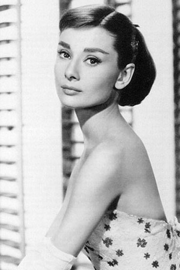 Audrey Hepburn posing for the cameras (https://astylesoiree.wordpress.com/2010/07/23/poem (unknown))