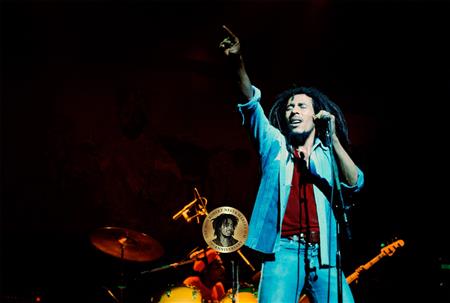 Bob Marley singing. (http://www.bobmarley.com/ (Official Bob Marley website.))