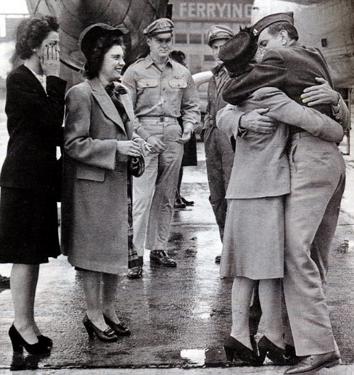 Zamperini embraces his family after years of war. (http://operationmeatball.squarespace.com/new-girlb ())