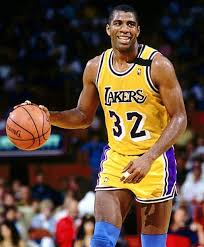 Magic Johnson playing for the NBA Lakers ((giant bombs))