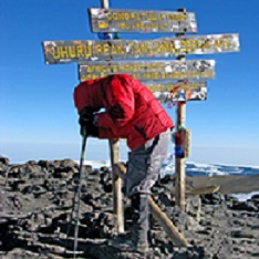Paddock at Uhuru Peak, summit of Mount Kilimanjaro (http://1man1mission.org/meet-worlds-first-ironman-cerebral-palsy/)
