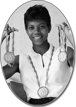 Wilma Rudolph holding medals