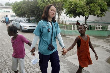 Dr. Megan Coffee taking a walk with the children. (https://www.postpositives.com/qweq86005?f=1 ())