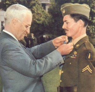 <a href=http://www.usconstitution.com/$so$1/harrytruman_desmonddoss.jpg>Doss receiving the Medal of Honor from President Truman</a>