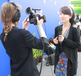 Slater interviews Yiting Wang at COP16 in Mexico, (Jared Schy)