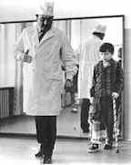 Dr. with a patient (Wikipedia Commons)